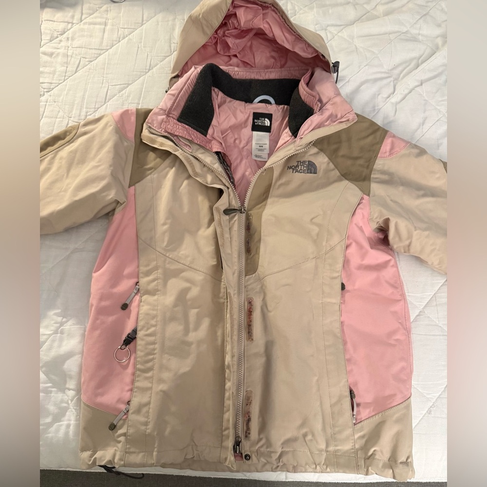 The North Face Women’s Pink and Beige Ski Jacket with zip out liner.